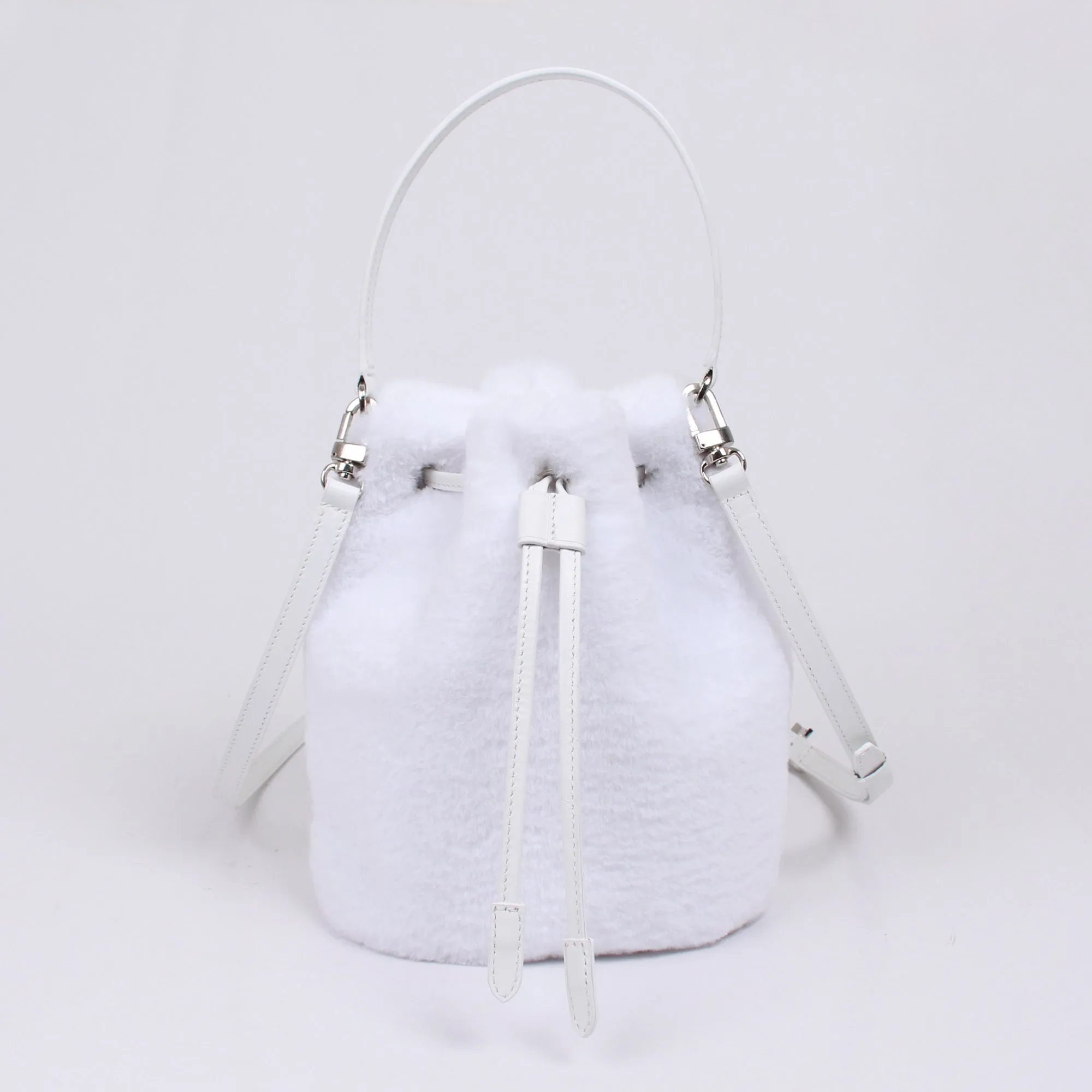 snow. fur shoulder bag.